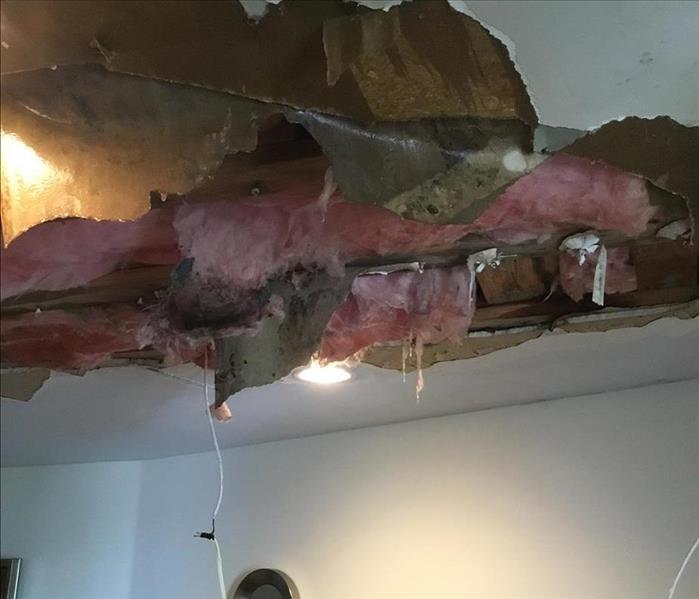 Ceiling caving in from water damage. 